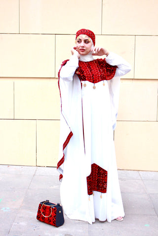 White dress embroidered with red