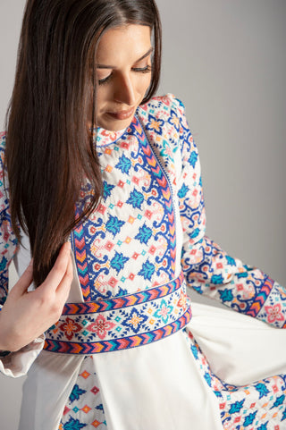 white dress with a mesmerizing blue and purple pattern