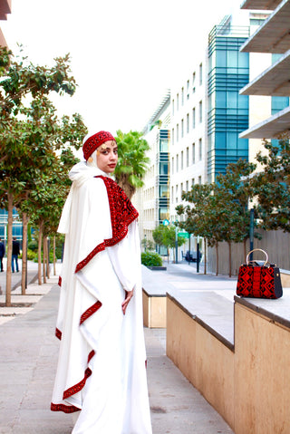 White dress embroidered with red