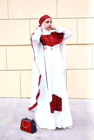 White dress embroidered with red