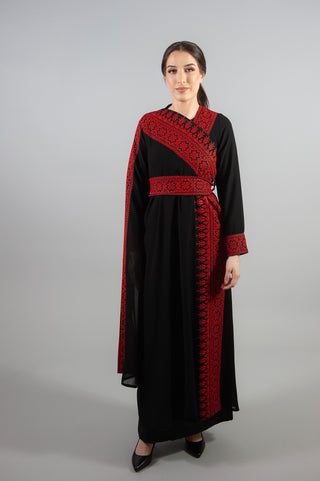 dress intricate embellishments, a gracefully wrapped waist belt, and a long sleeve for added refinement