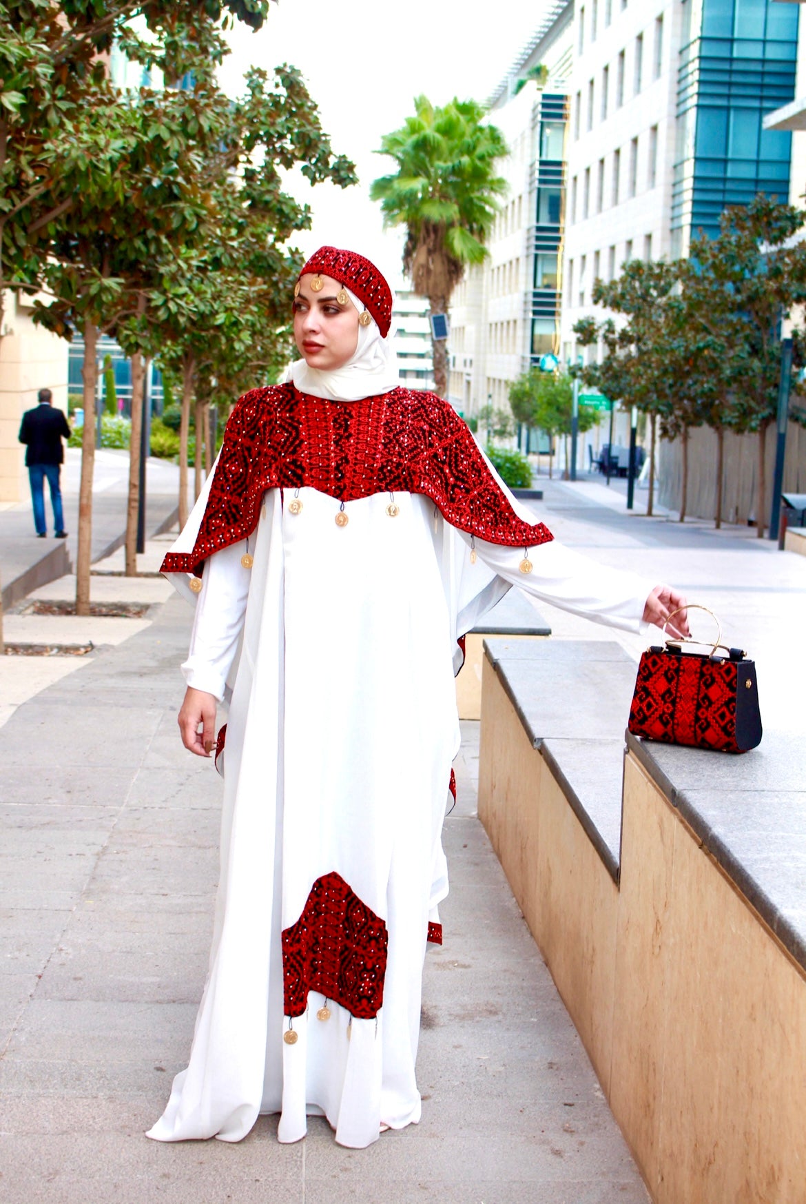 White dress embroidered with red