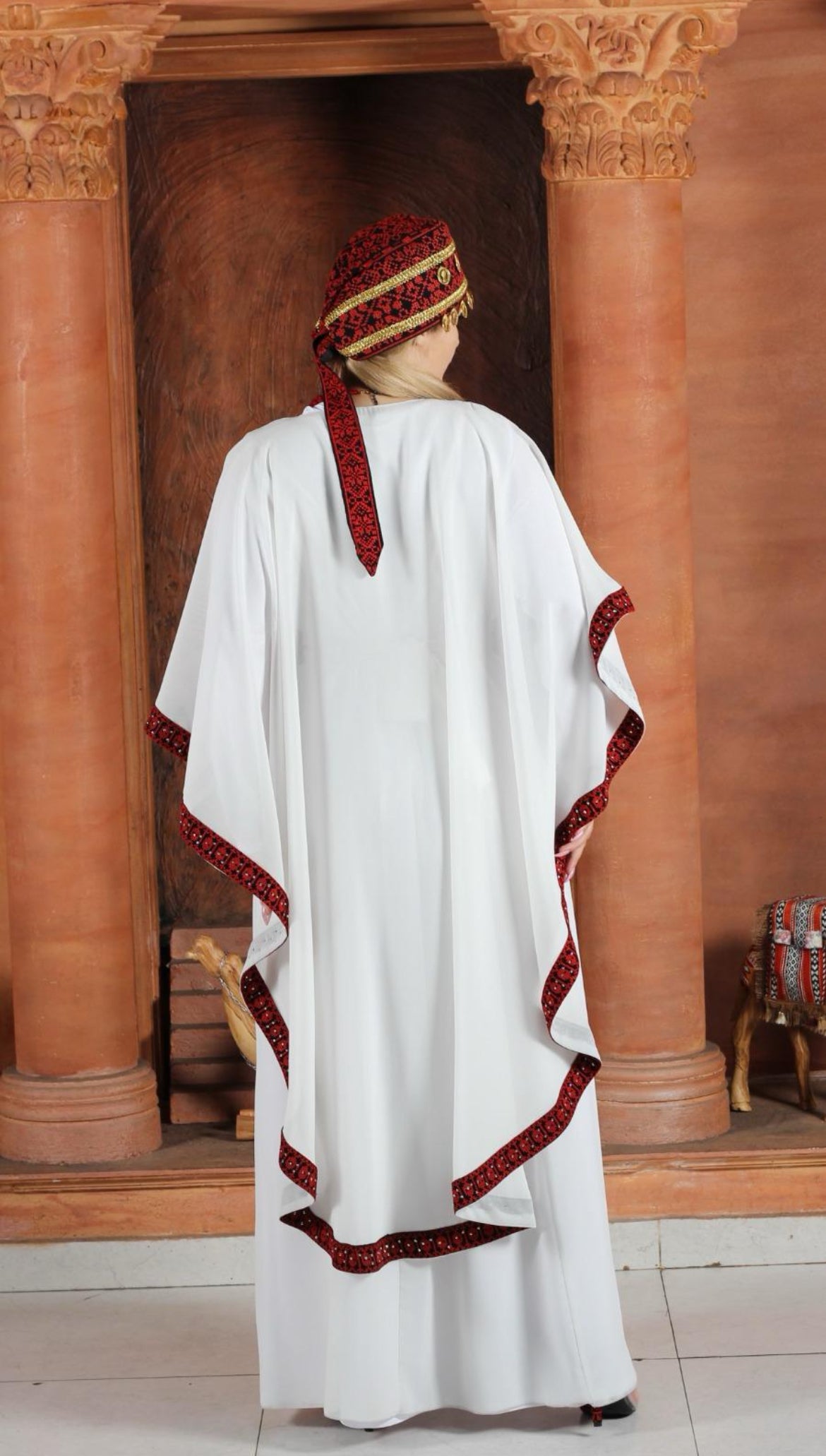 White dress embroidered with red